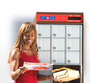 Customer receiving a package at a community mailbox