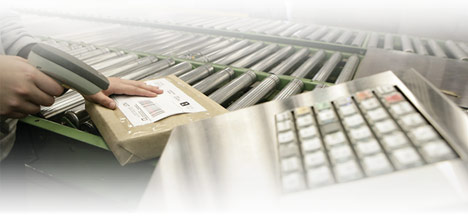 Employee scanning a parcel's bar code