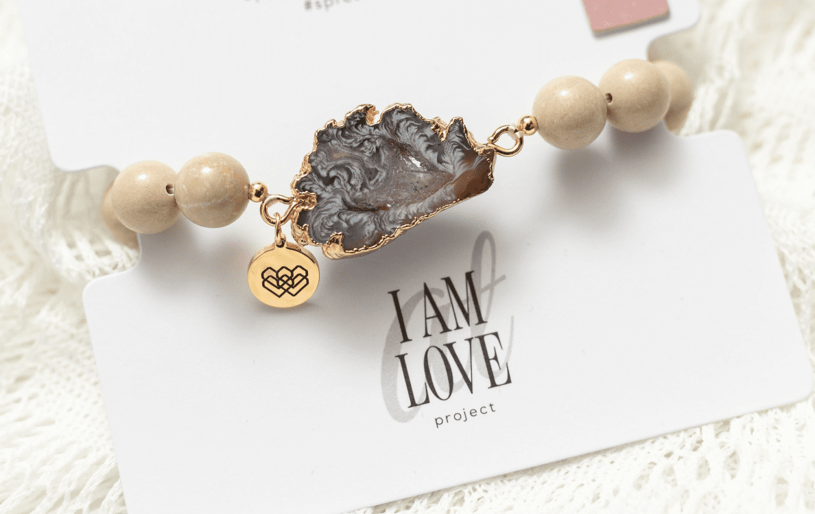 A piece of jewellery from I Am Love Project in its packaging