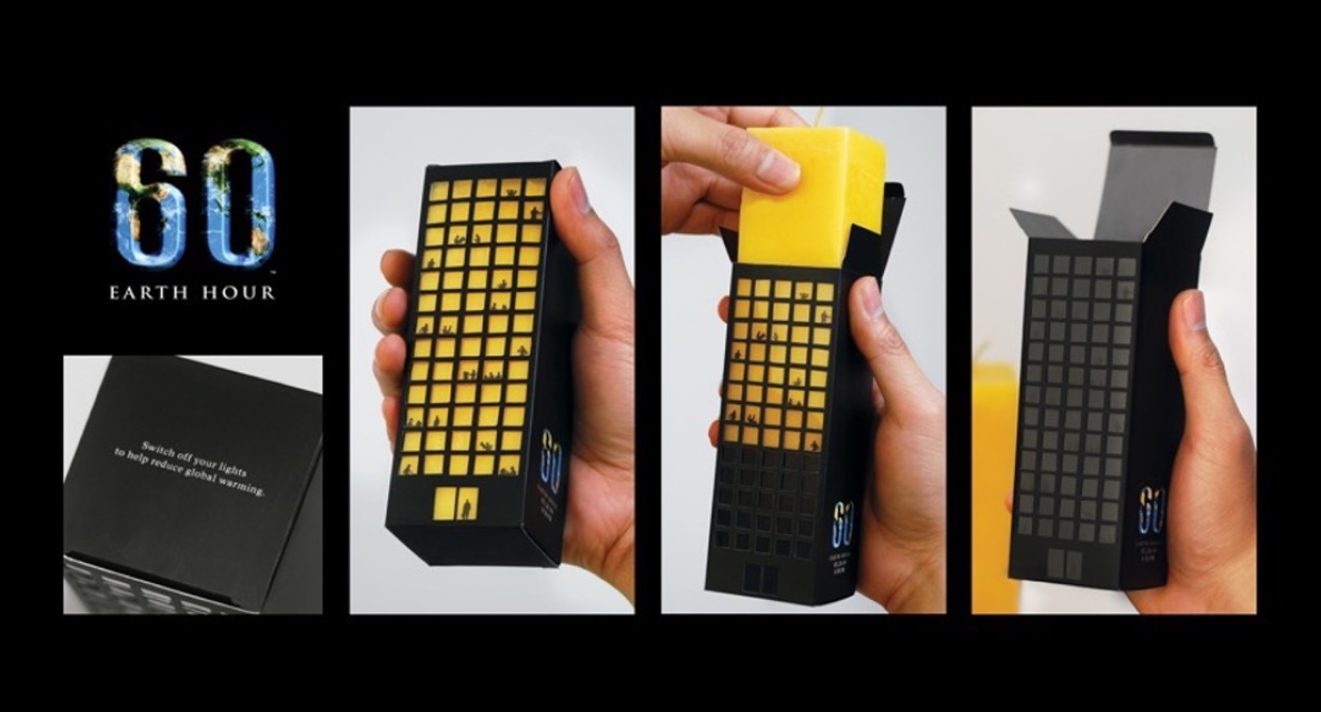 Multiple images show off Earth Hour’s direct mail campaign of a large yellow candle in a black box that looks like an office buildings with its lights on. In the final image the candle is removed, making the building look like its lights are off. 