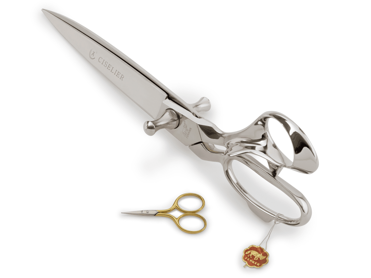A large and small pair of steel scissors from Ciselier.