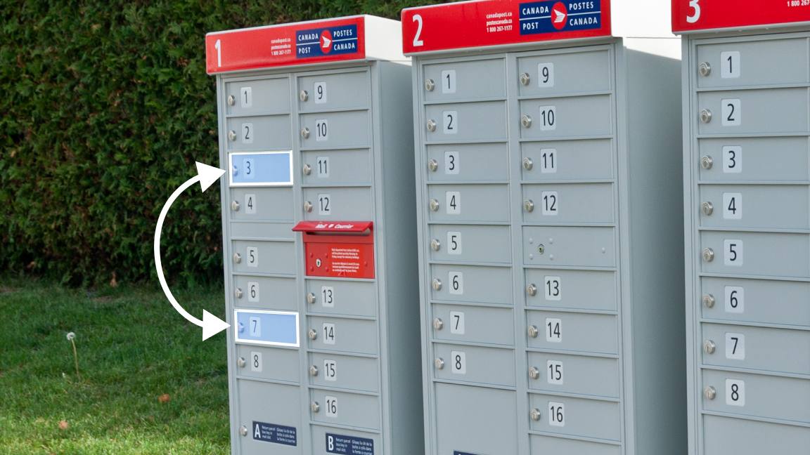 On a community mailbox, a 2-way arrow is indicating that a higher compartment and lower compartment can be switched. On a community mailbox, a 2-way arrow is indicating that a higher compartment and lower compartment can be switched.