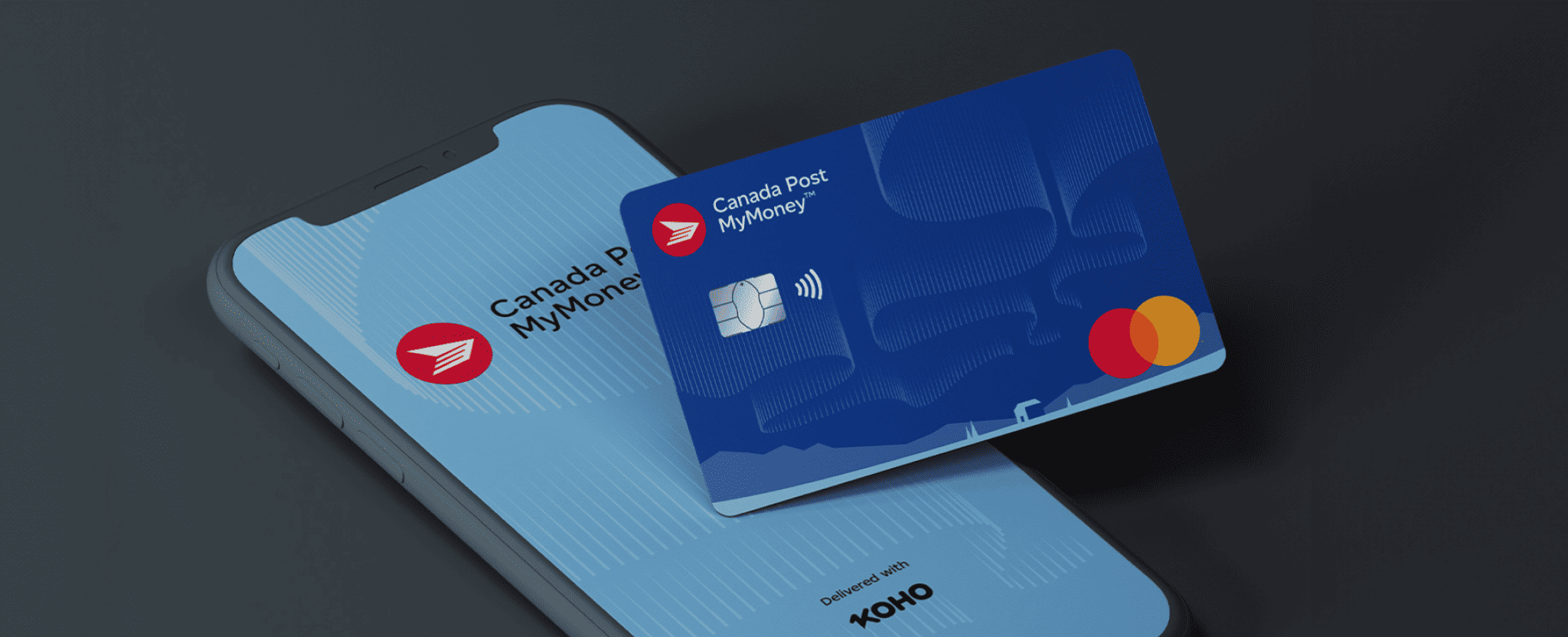 The Canada Post MyMoney card sits on a smartphone screen. The screen says “Canada Post MyMoney, delivered with KOHO”.