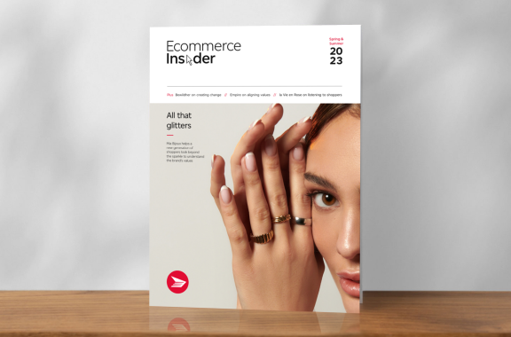 The cover of the spring/summer issue of Ecommerce Insider magazine features a woman holding her hands by her face wearing three rings.