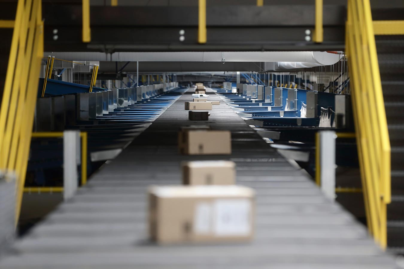 Packages on a conveyor belt in a mail processing centre