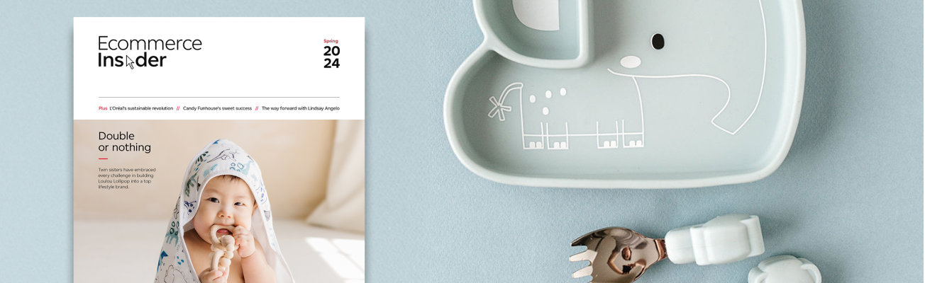 A copy of the Spring 2024 issue of Ecommerce Insider magazine sits beside a baby’s silicone plate that resembles an elephant with two pieces of matching cutlery.